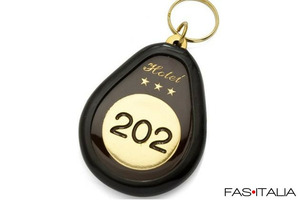 Portachiavi Hotel ovale in ottone massiccio con logo in rilievo